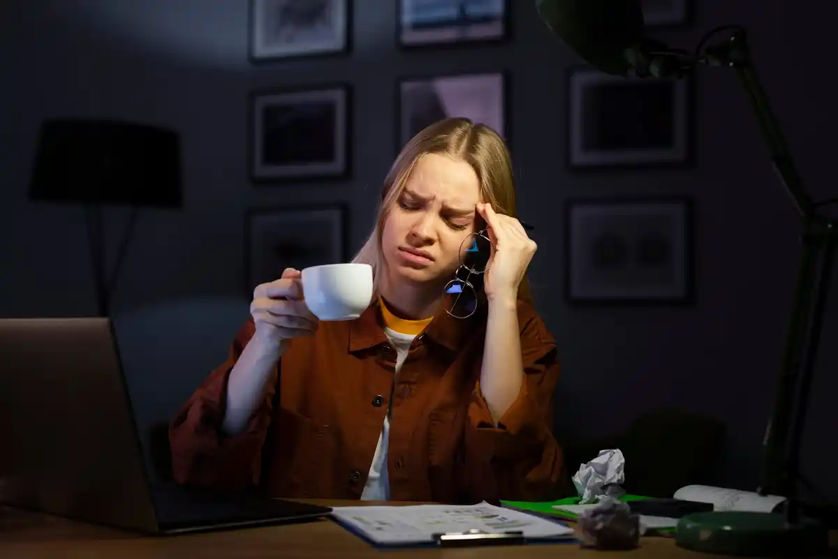 person avoiding procrastination working focused