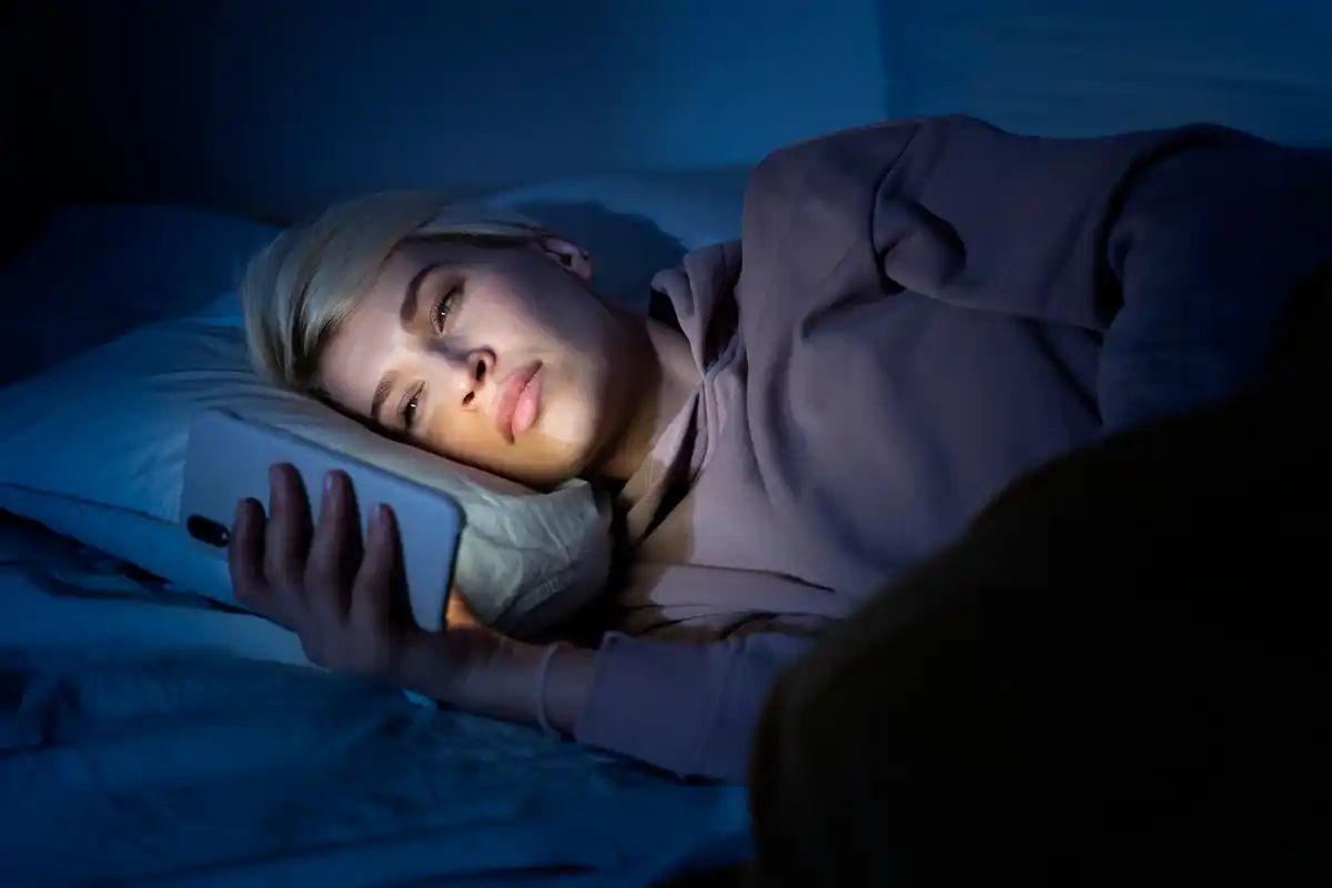 tired person trying to sleep at night