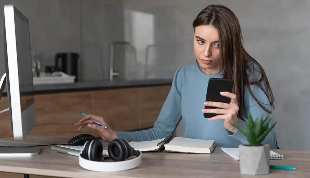 person fixing technology device at home
